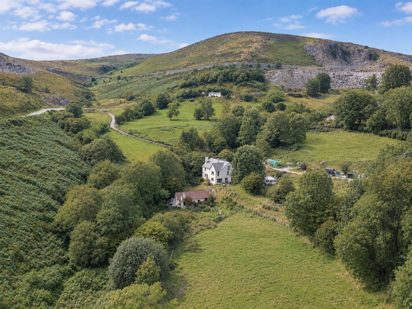 Farmhouse with outbuildings in Llangollen