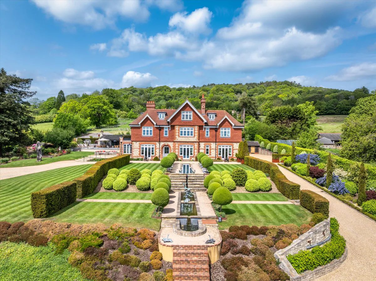 Country house with outbuildings in West Sussex GU27
