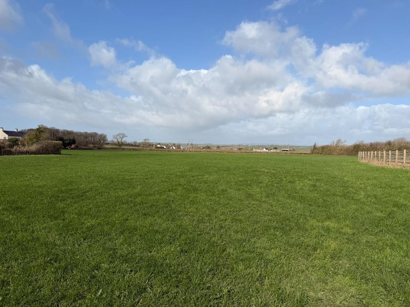 1. Approximately 6.064 acres of Agricultural Land