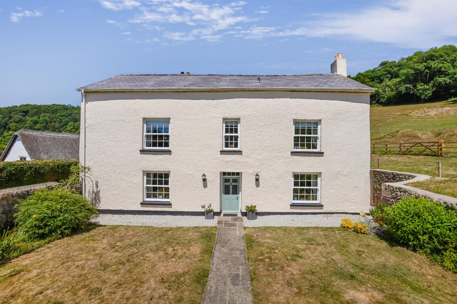 Spacious Georgian farmhouse with 5.37 acres and equestrian facilities