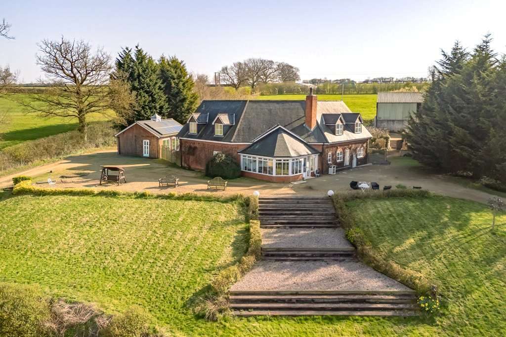 Oakham: farmhouse with outbuildings
