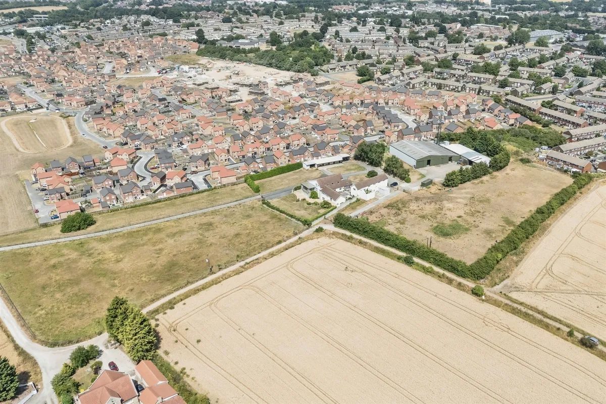KNOTTINGLEY: detached house with outbuildings