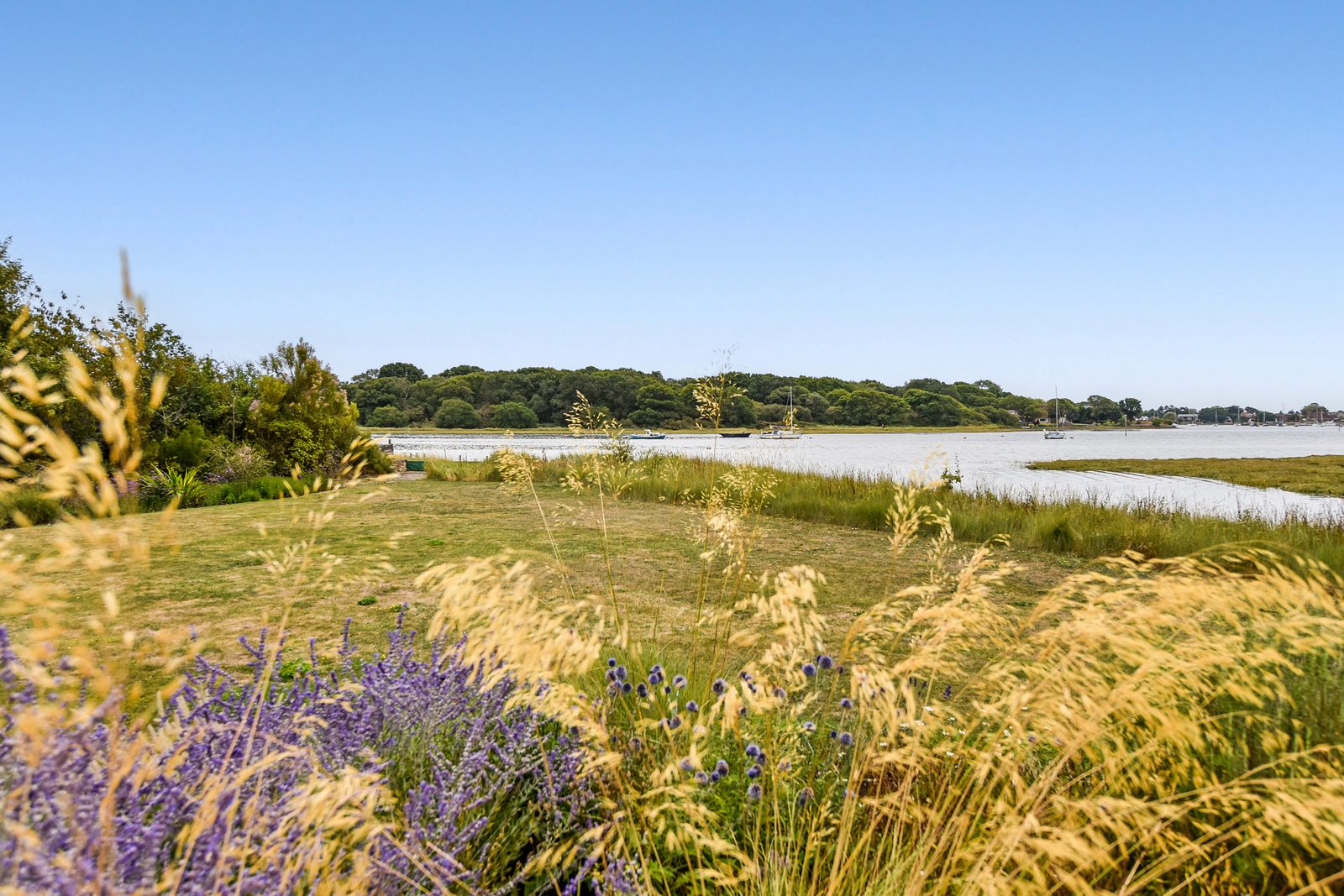 Architect-designed masterpiece with far-reaching views over Furzefield Creek
