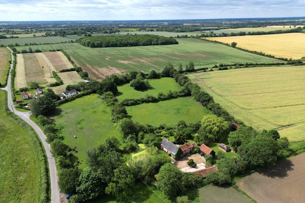 Farmhouse with outbuildings in Bedingham