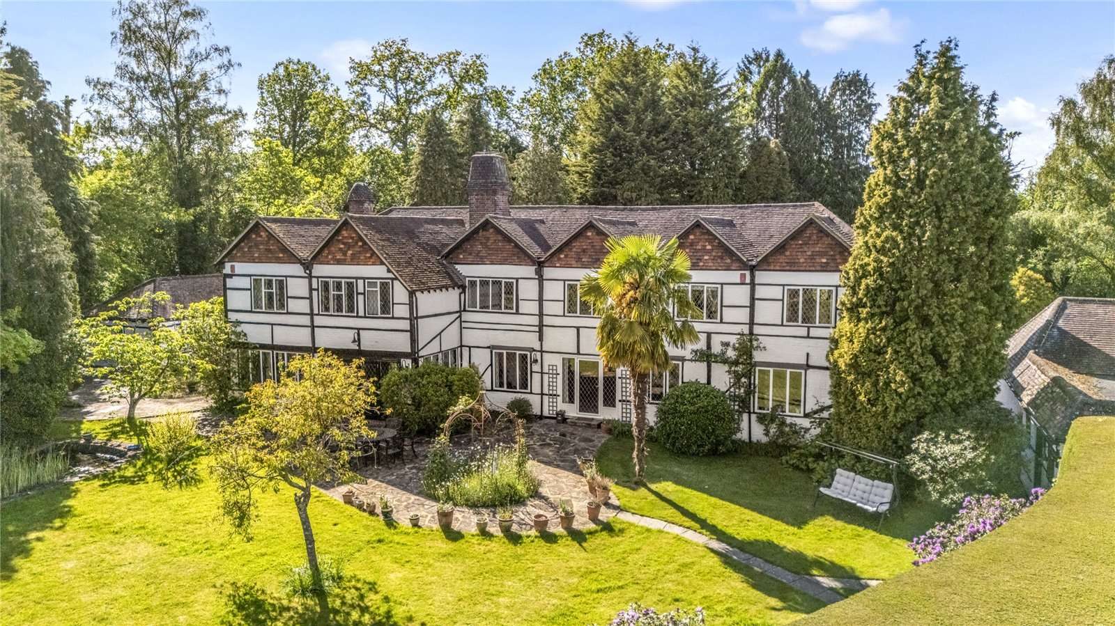 House with a pool in Crawley
