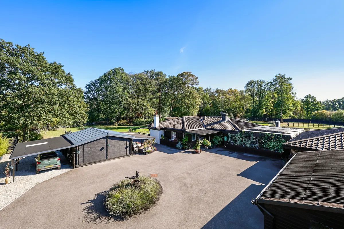Detached house with outbuildings in Horley