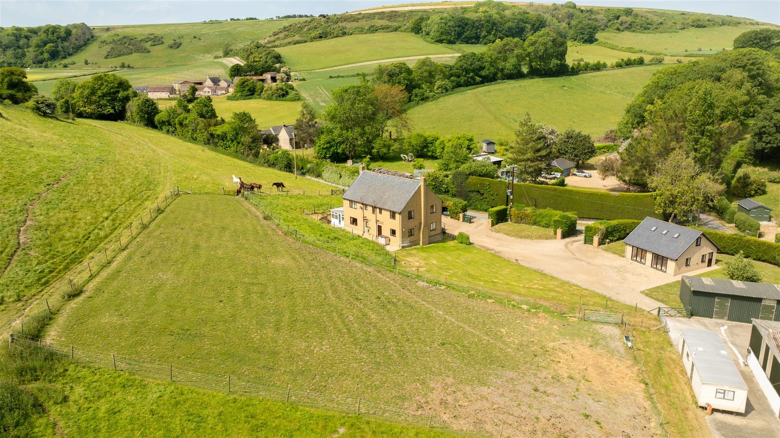 EQUESTRIAN LAND, SAND SCHOOL, OUTBUILDINGS AND DETACHED HOUSE – Newbarn