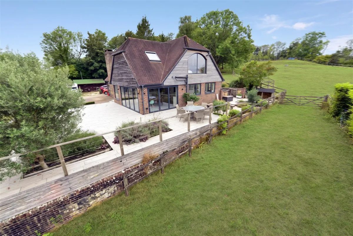 Storrington: house with outbuildings