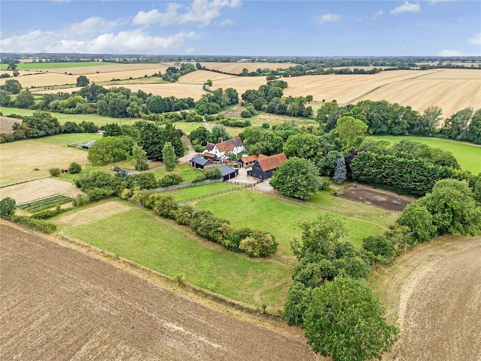 Woodbridge: barn conversion with outbuildings