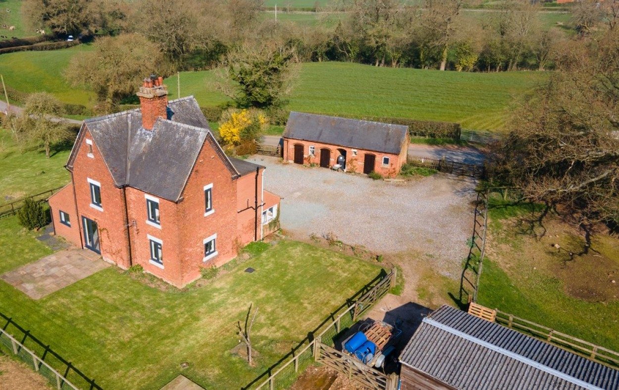 Farmhouse with outbuildings in Market Drayton