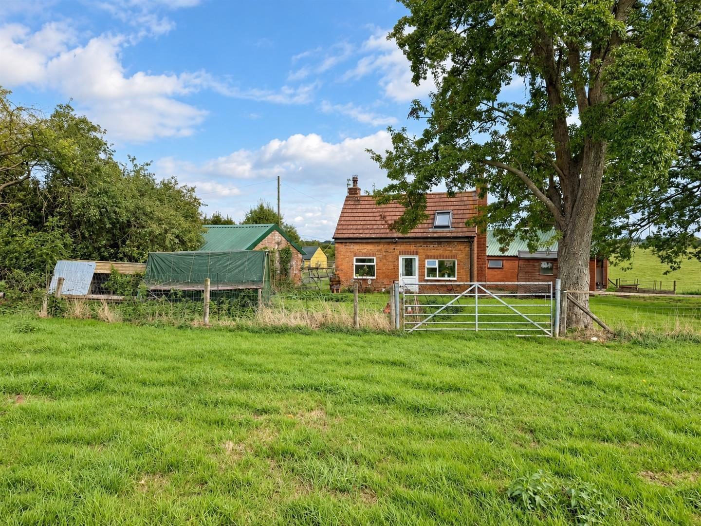 Whitchurch: cottage with outbuildings