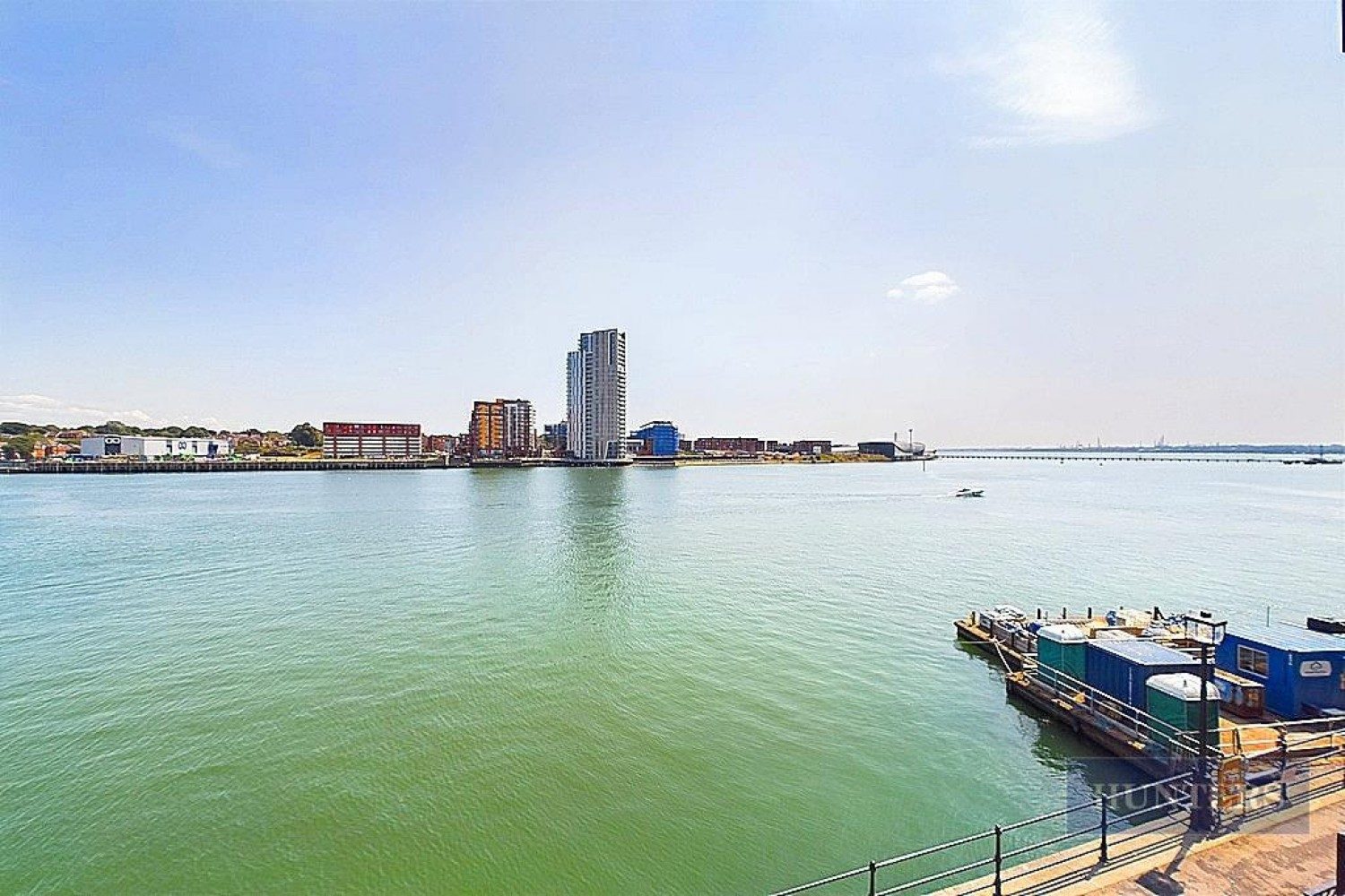 Ocean Village: waterfront apartment with a mooring