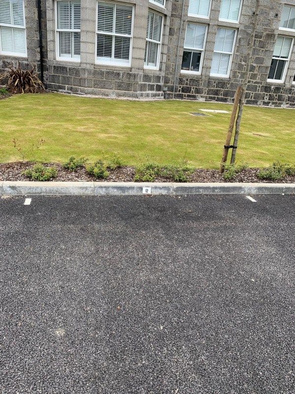 Parking on May Baird Place, AB25