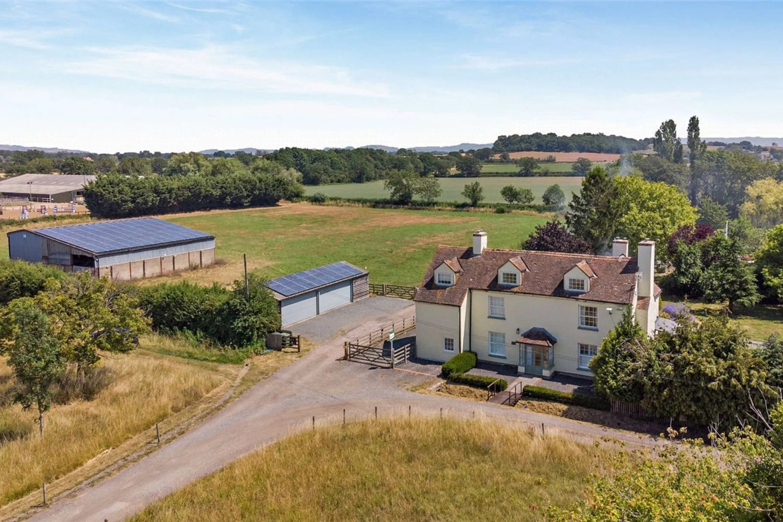 Detached bungalow with outbuildings in Gloucestershi
