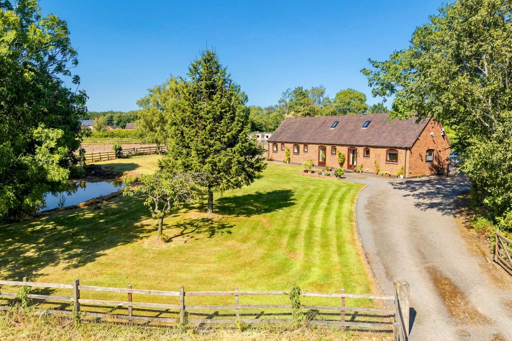 Barn conversion with outbuildings in Boundary
