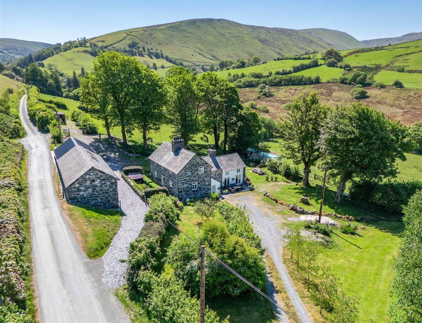 Farmhouse with outbuildings in Bala