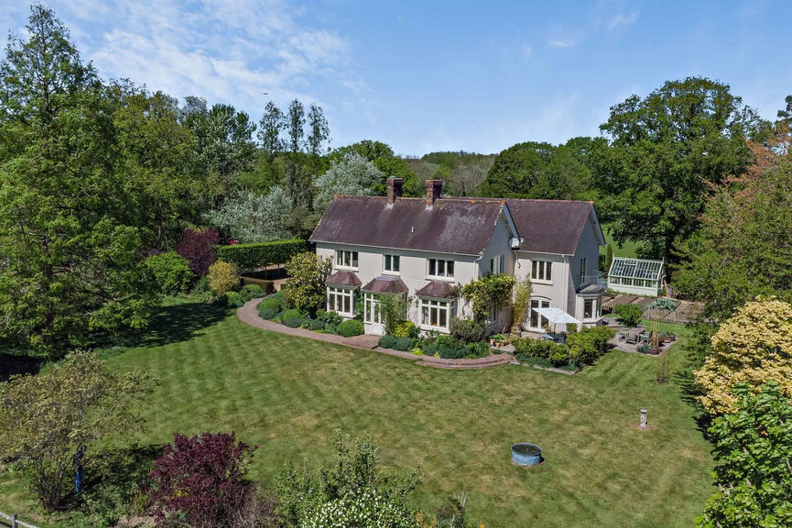 Nr. Horsham: house with outbuildings