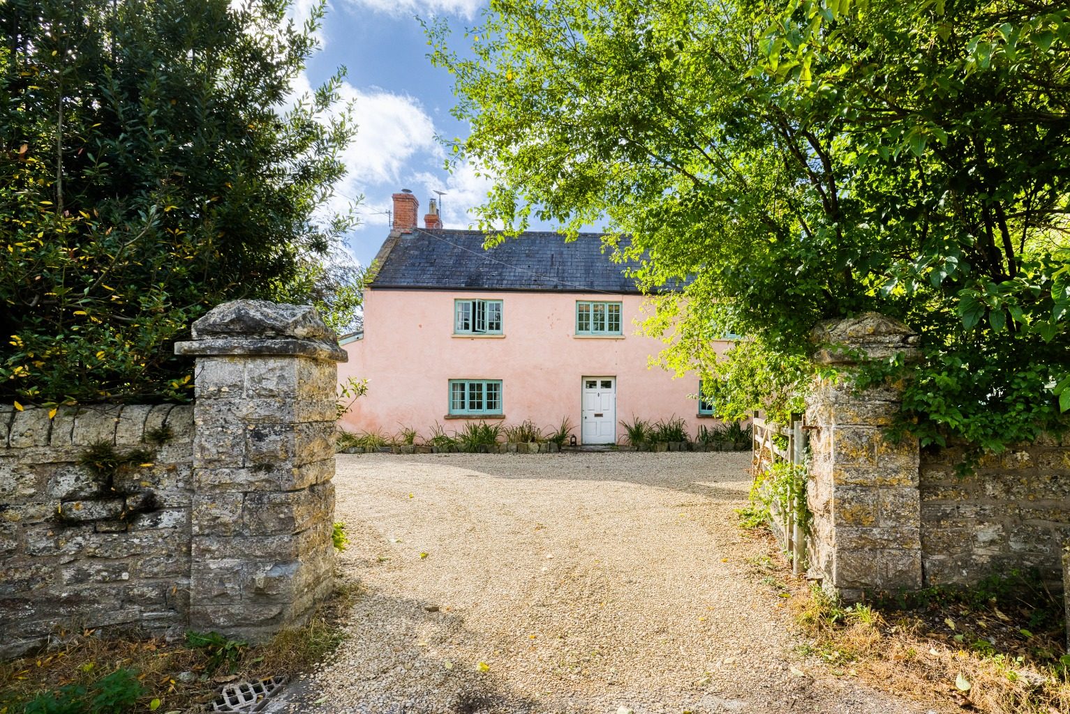 Wells: farmhouse with outbuildings