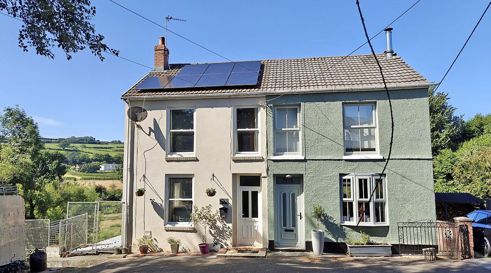 Kidwelly CARMARTHENSHIRE: semi-detached house with outbuildings