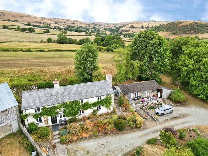Detached house with outbuildings in Oswestry