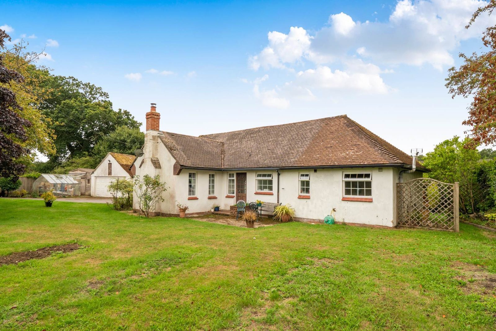 Hampshire - About 3.9 Acres: detached bungalow with paddocks