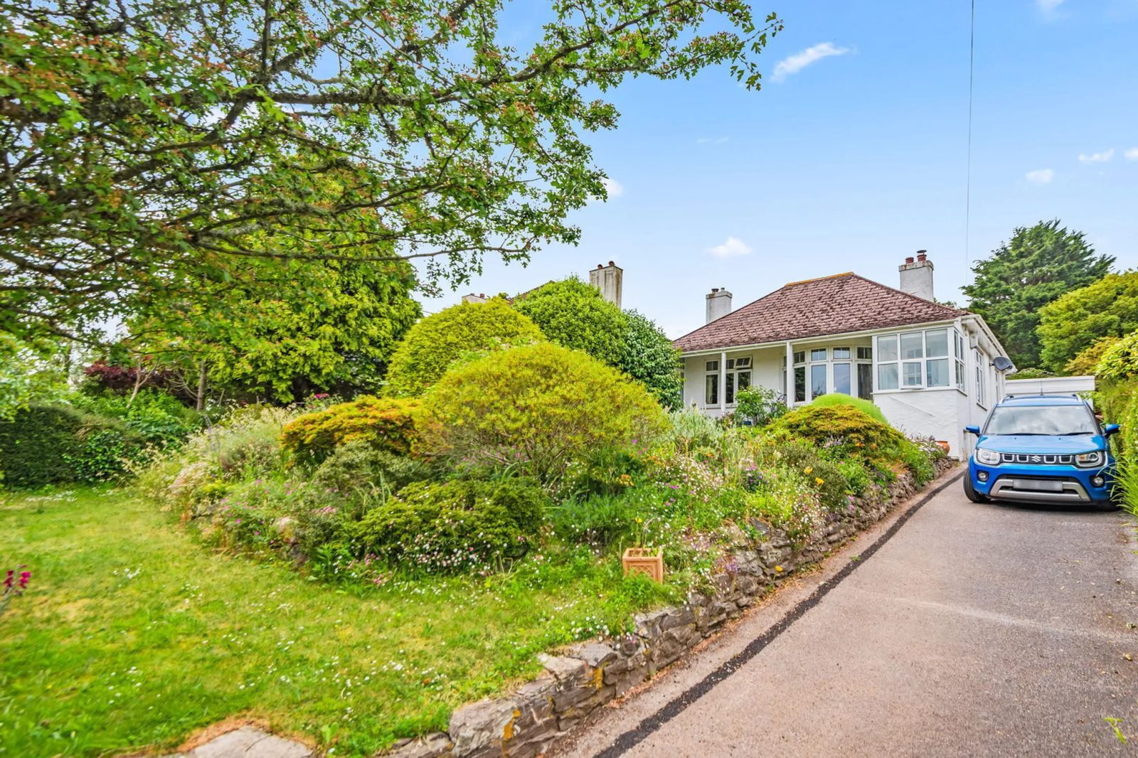 Detached bungalow with a mooring, South Devon